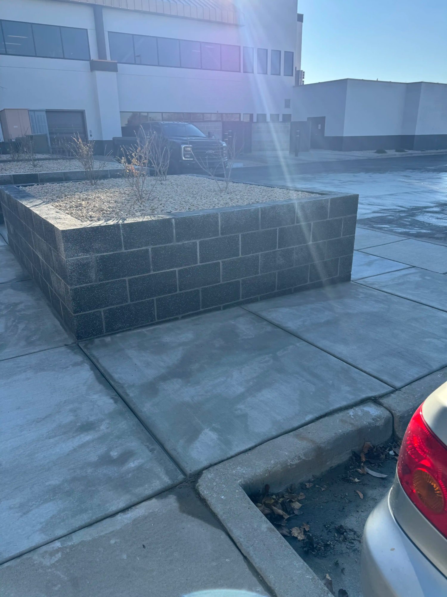 Commercial hardscape parking lot concrete installation by EC Hardscape Utah